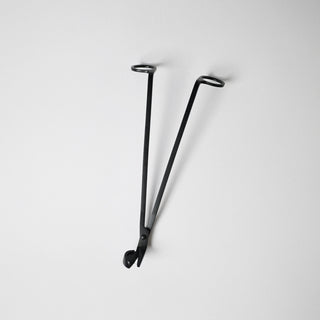 the black wick trimmer with a white background