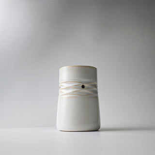 a white ceramic lattice melter