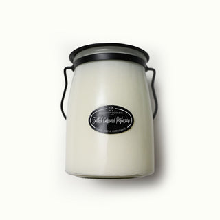 White jar with black lid and label on a white background