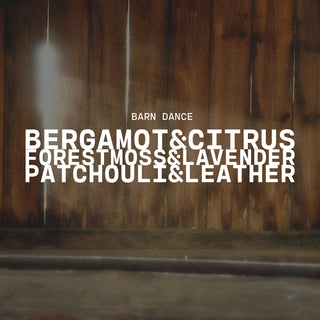 Text overlay on a wooden background with product name of Barn Dance and description of bergamot & citrus, forest moss & lavender and patchouli & leather