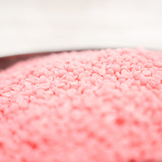 Close-up of pink wax beads