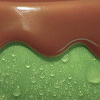 dripping carmel on a apple 