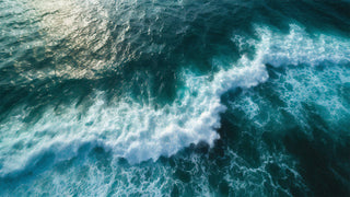 a blue ocean breaking on a reef 