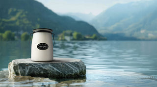 a lifstyle picture of a 22oz jar of a North Shore candle 