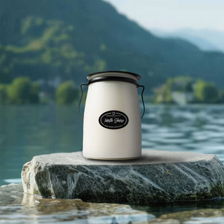 22oz north shore candle on a rock in a lake 