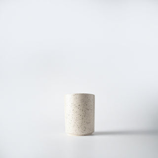 a cream flecked votive of luna lux 