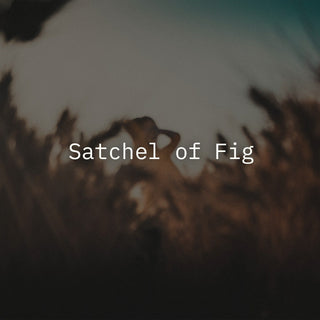 satchel of fig writen on a blurred out photo of a field 