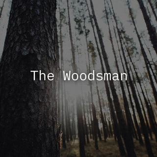 the woodsman writen in a sunlit forest 
