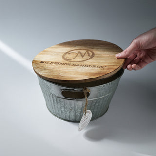 monster tin with the tag off the handle and the wood lid 