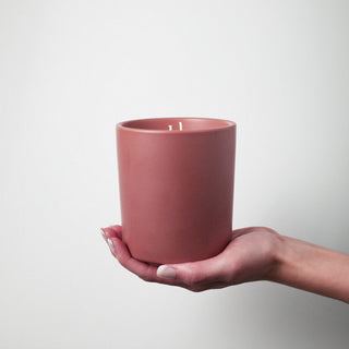cashmere blush candle held 